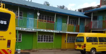School buses in front of classrooms